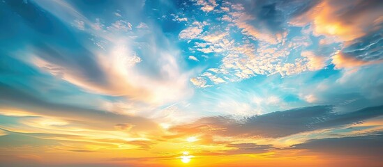 Poster - Scenic sunset featuring a cloudy sky with cirrus clouds in shades of blue, orange, and yellow, providing a natural background for a copy space image.