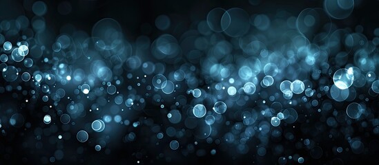 Leinwandbilder - A dark background with white bokeh creates an elegant look with copy space image.