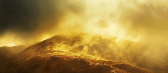 Poster - Mountain bathed in sunlight showcases yellow and brown hues with dark clouds drifting in the background, featuring noise and grain in the copy space image.