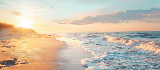 Poster - Coastline at sunset with a view of the ocean and a sandy beach with a copy space image