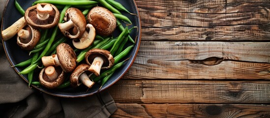 Poster - Table set with delicious mushrooms and green beans on a plate with copy space image