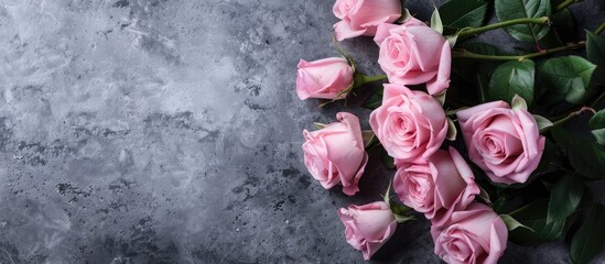 Poster - Trendy pink rose bouquet on a gray backdrop with copy space image