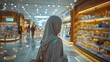 © YOGI C - Woman in a Grey Hijab Shopping in a Department Store - Photo