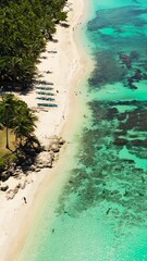 Wall Mural - Aerial drone of Sandy beach and turquoise water. Pagudpud, Ilocos Norte Philippines