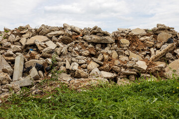 Wall Mural - A low angle view of the many concrete ruins that have been demolished.