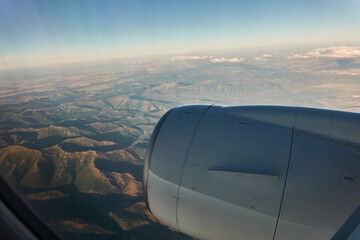 Views of clouds and clearings from a plane Madrid - Paris