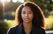 © Ken - black woman teacher in classroom dramatic lighting diversity and inclusion dei
