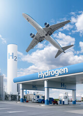 Wall Mural - Fuel cell car at the hydrogen filling station and airplane in the sky. Clean mobility concept.