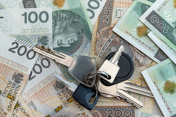 Poster - stack of Polish money PLN banknotes with house key to the flat lying