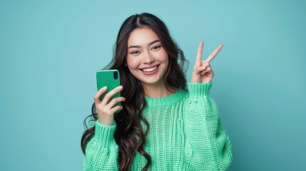 Wall Mural - The woman with green smartphone