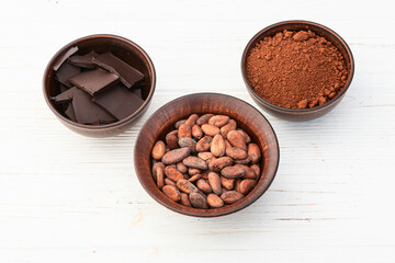 Canvas Print - Cocoa beans grain in bowl . Ingredient for preparating chocolate