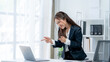 © Kritdanai - Beautiful Asian girl celebrate with laptop, success happy pose. E-commerce, university education, internet technology, or startup small business