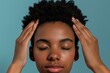 © rsimona - Close-up of a young woman receiving a head massage
