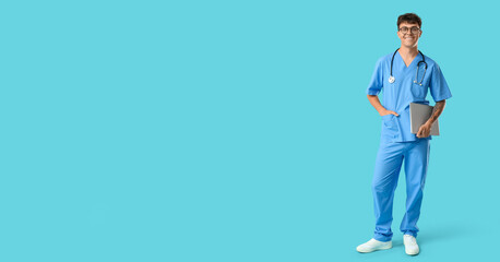 Poster - Male medical student with modern laptop on blue background