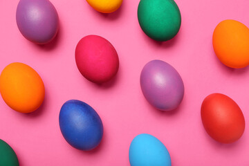 Wall Mural - Colorful Easter eggs on pink background