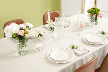 Wall Mural - Festive table setting for wedding near green wall in dining room