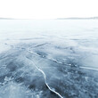 © AlexCaelus - Close-up of a frozen lake with visible cracks in the icy surface, showcasing winter's raw beauty and serene cold environment.