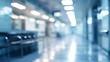 © Ashi - Abstract blur of modern hospital and clinic interior with bright lighting, white walls, and medical equipment in the background, ideal for healthcare, medical facilities, and clinical research concept