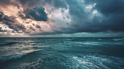 Wall Mural - sunset seascape with stormy clouds over serene ocean waters
