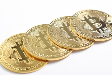 Bitcoin isolated on white background. Cryptocurrency. close-up shot, Group of Golden bitcoin physical gold coin. Symbol of the crypto currency