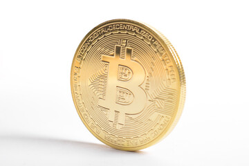 Bitcoin isolated on white background. Cryptocurrency. Golden bitcoin physical gold coin. Symbol of the crypto currency