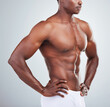© Michael Cunningham/peopleimages.com - Black man, muscle flex and shirtless in studio for bodybuilding progress, growth and wellness. Muscular, male athlete and bodybuilder with biceps for sports, health and confidence on white background