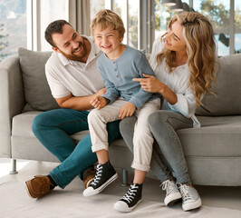 Wall Mural - Laughing, love and child with property, happy family or siblings to relax with security, safety or care. Smile, boy or funny parents on sofa with kid, support and trust for bonding together in home