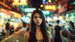 © Wachirasak Jamwimol - Young Woman in Busy Night Market with Neon Lights