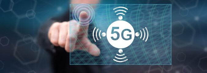 Wall Mural - man touching a 5g concept