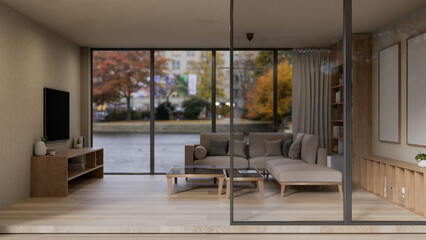 A modern minimalist living room features a cozy couch, a TV on the wall, and a large glass window.