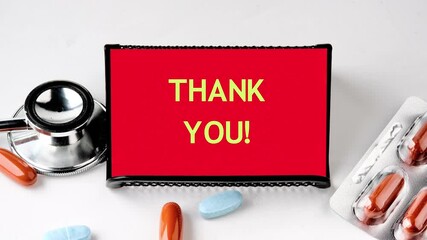 Wall Mural - Animation of the phrase THANK YOU on the red card. Thank you message.