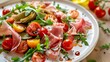 © Yelena - Salad with prosciutto artichokes cherry tomatoes and arugula image