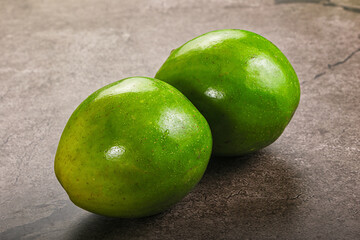 Two ripe green exotic avocado fruit