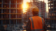 © ramaheda - A civil engineer stands looking at the construction site