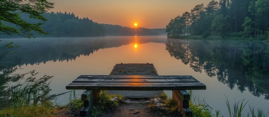 Poster - Tranquil Sunrise Over a Misty Lake