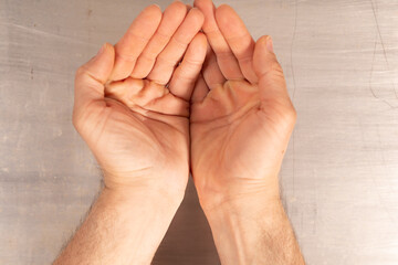 Poster - Two open palms facing upwards ready to receive