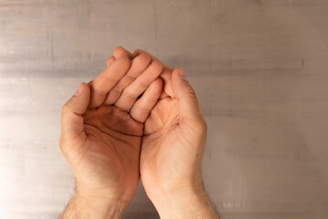 Poster - Two cupped hands reaching out