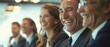 © Onchira - Happy businesspeople laughing in an office during meeting