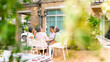 © CandyRetriever  - Group of Happy Asian senior mature women relax and enjoy indoor lifestyle meeting party together at home. Elderly retired woman friends drinking tea with talking together in the garden in summer day.