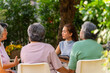 © CandyRetriever  - Group of Asian senior mature woman talking discussion about mental health life problem thoughtful with professional psychiatrist in the garden. Elderly people mental health care and therapy concept.