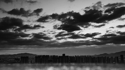 Canvas Print - Time lapse of  city before the storm at night