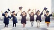 © Felippe Lopes - Adorable children in graduation gowns celebrate their achievement.