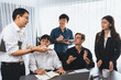 © InfiniteFlow - Diverse group of office worker and employee applauding, happily collaborate on strategic business marketing planning. Teamwork and positive attitude create productive and supportive workplace. Prudent