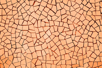 Wall Mural - Bright orange puzzle background. Geometric shapes pattern. Mosaic pieces background. Ceramic decoration texture. Puzzle look graphic design. Vibrant color texture.