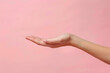 © StockLab - Crop shot of a woman's cupped hand