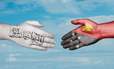 Papua New Guinea and Afghanistan country handshaking with flags, consensus concept international co-operation illustration