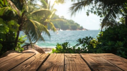 Aufkleber - In the foreground, a wooden table top is surrounded by lush green palm trees and vegetation. In the blurred background, a tropical beach and calm blue ocean create a serene setting