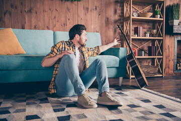 Sticker - Photo of funky cool guy dressed checkered shirt relaxing home ready play guitar indoors house apartment room