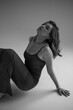 © alipko - Vogue style woman in long brown slim dress