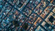 © Pornnapa - Discover the mesmerizing patterns of urban life with an aerial view of the city's heart.